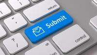 A keyboard with a blue Submit button in the enter button location